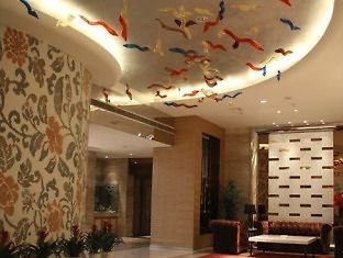 Haishu Taosheng Yiju Business Hotel Ningbo Luaran gambar